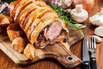 Pork tenderloin in wellington style in puff pastry