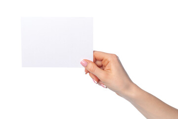 Woman's hand holding blank white sheet of paper isolated on white