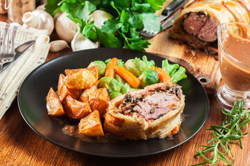 Pork tenderloin in wellington style in puff pastry