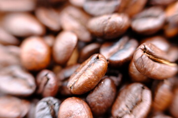 close up coffee beans and macro coffee beans on wood table 