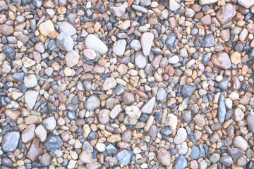 Stone pavement texture or colorful gravel patterns background top view