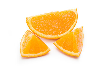 Naklejka na ściany i meble Orange fruit cut into pieces.
