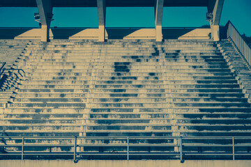 View of soccer field in the arena stadium background. Football sport championship tournament and exercise concept. Playground to play competitive game. Vintage or retro style.