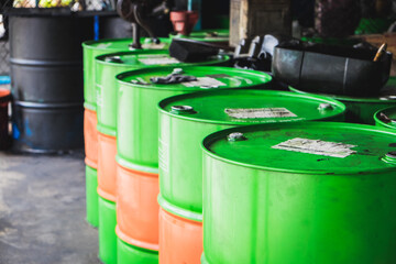Industry oil barrels tank at the garage background.