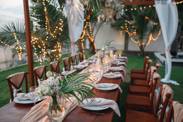 Wedding decoration table in the garden, floral arrangement, In the style vintage & rustic on...