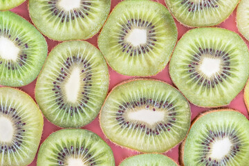 Collection of fresh Kiwi slice isolated on pink background.