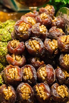Vertical closeup shot of traditional Eastern dessert - Hashtak (dried fruits with walnuts)