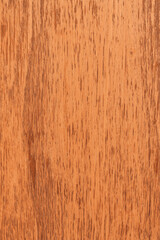 Antique vertical wooden board with peeling paint. Abstract vintage red textured background.