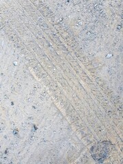 Car tyre mark on the sand