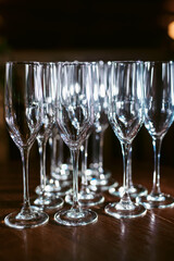 Set or row glasses of wine on the table before reception or wedding party