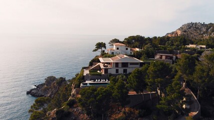 Port Soller,Spain Aerial of luxury house villa with private pool water. 
