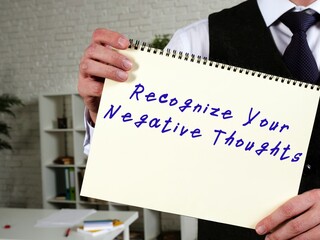 Conceptual photo about Recognize Your Negative Thoughts with handwritten text.