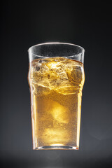 Glass of beer on black background, copy space