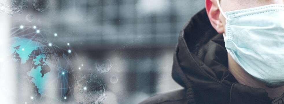 Male with a medical mask with the background of coronavirus cells and earth globe