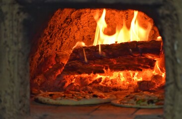 fire in fireplace cooking food