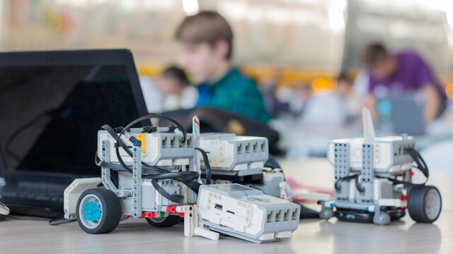 Minsk, Belarus. March, 2018. Boys construct and code robots. Lego Mindstorms EV 3 competition. STEM education.  Concept of battle. Robotics class for child and teen. School.  Mathematics. Science. 
