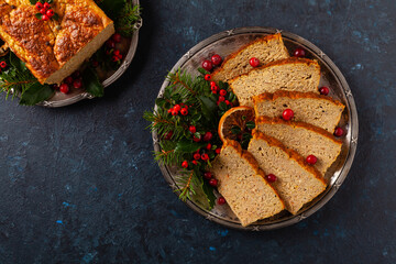 Delicious chicken and pork pate in Christmas decoration. Rustic style. Dark background, metal...