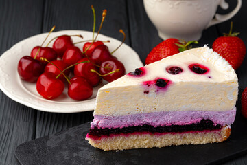 Soft berry souffle cake decorated with berries