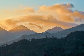 clouds over the mountains at sunset