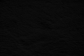 Black stucco texture. Architectural abstract background. Dark wall of building.