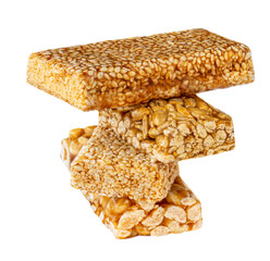 Honey Nut bars with peanut isolated on white background. Heap of Granola energy  organic bars