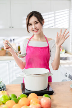 Asian housewife cook healthy meal