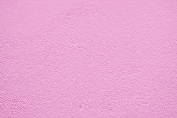Pink stucco texture. Architectural abstract background. Pink wall of building.