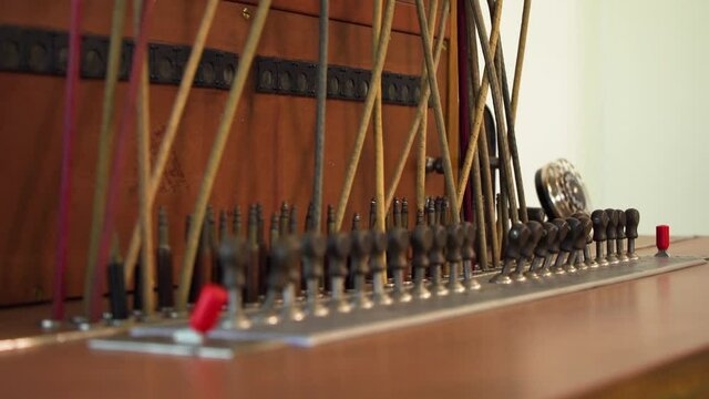 Vintage switchboard with a variety of buttons and switches, historical equipment