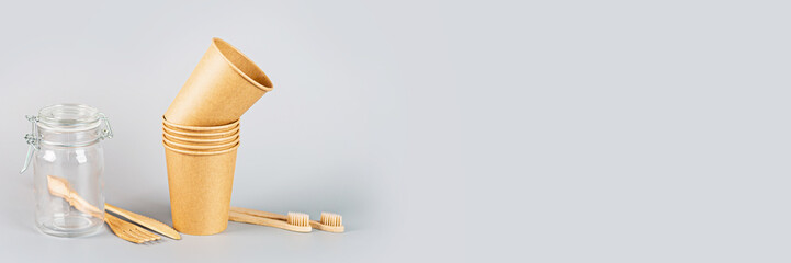 eco natural paper cups on gray background. sustainable lifestyle concept. zero waste, plastic free items. stop plastic pollution. Copy space, template, Mockup. High quality photo