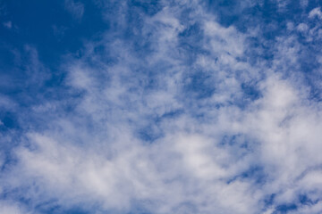 Clouds against the blue sky.