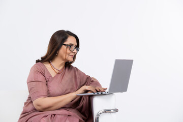 Senior Indian Woman Working with Laptop