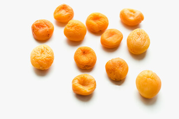 dried apricots on a white background, dried fruits
