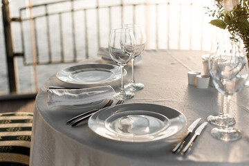 Fancy table set for a wedding romantic dinner in restaurant