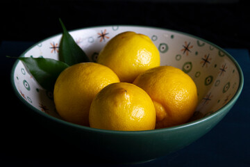 Grenn rustic bowl of lemons