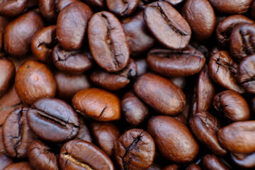 close up coffee beans and macro coffee beans on wood table 