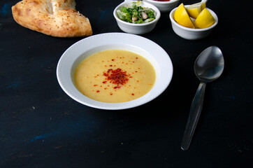 lentil soup on a black background