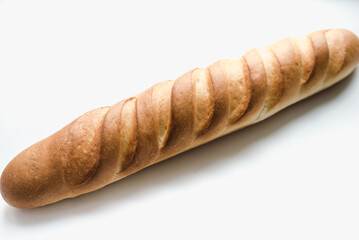 baguette on a white background, sliced ​​long loaf, sliced ​​long loaf on a white background, bakery products