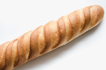 baguette on a white background, sliced ​​long loaf, sliced ​​long loaf on a white background, bakery products