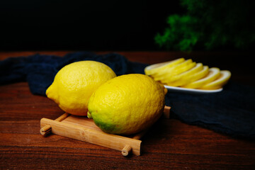 Group of fresh ripe lemon on an old vintage wooden table
