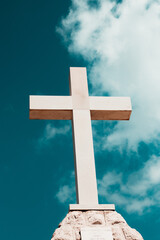 Huge white modern cross on the hill near town of Stargrad, island of Hvar in Croatia