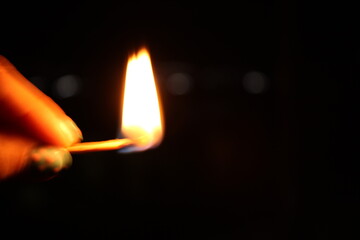 burning match in a hand