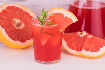 
Fresh grapefruit juice in a glass. Close-up.