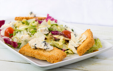 Salad with blue cheese from the side closer