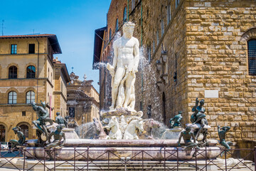 Piazza della Signoria and Fountain of Neptune in Florence. Piazza della Signoria is the square in front of the Palazzo Vecchio, gateway to Uffizi Gallery, and Loggia della Signoria