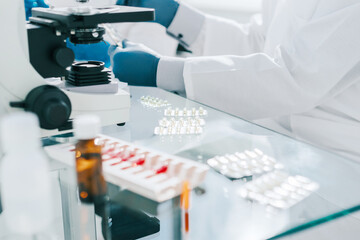 control samples of the drug on the table in the laboratory .