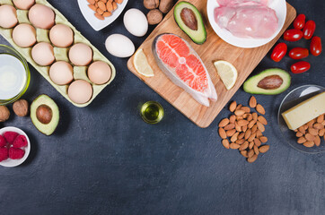 Keto diet, low carb healthy food on black background