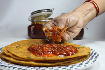 Aam Chhunda or Raw Mango Pickle is Indian side dish served with Chapati,roti or Thepla in the state...