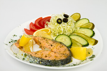 Grilled salmon steak with vegetables
