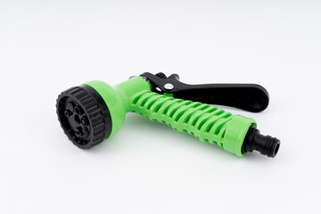 Black - Green Plastic Watering Garden Hose Sprayer Multi-functional spray gun isolated on white background.