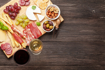 Cheese, meat, grapes and olives antipasto